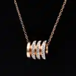 collier talisman cylindre or​ 5
