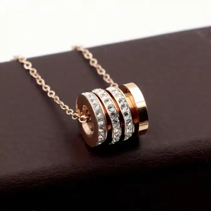 collier talisman cylindre or​ 7