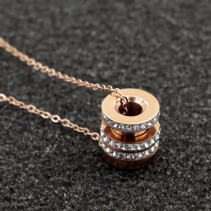 collier talisman cylindre or​ 8