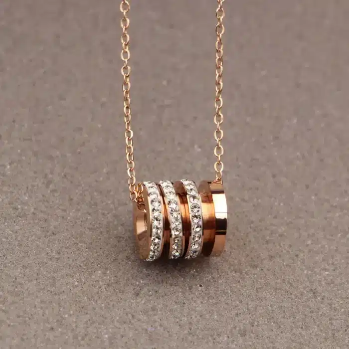 collier talisman cylindre or​ 3